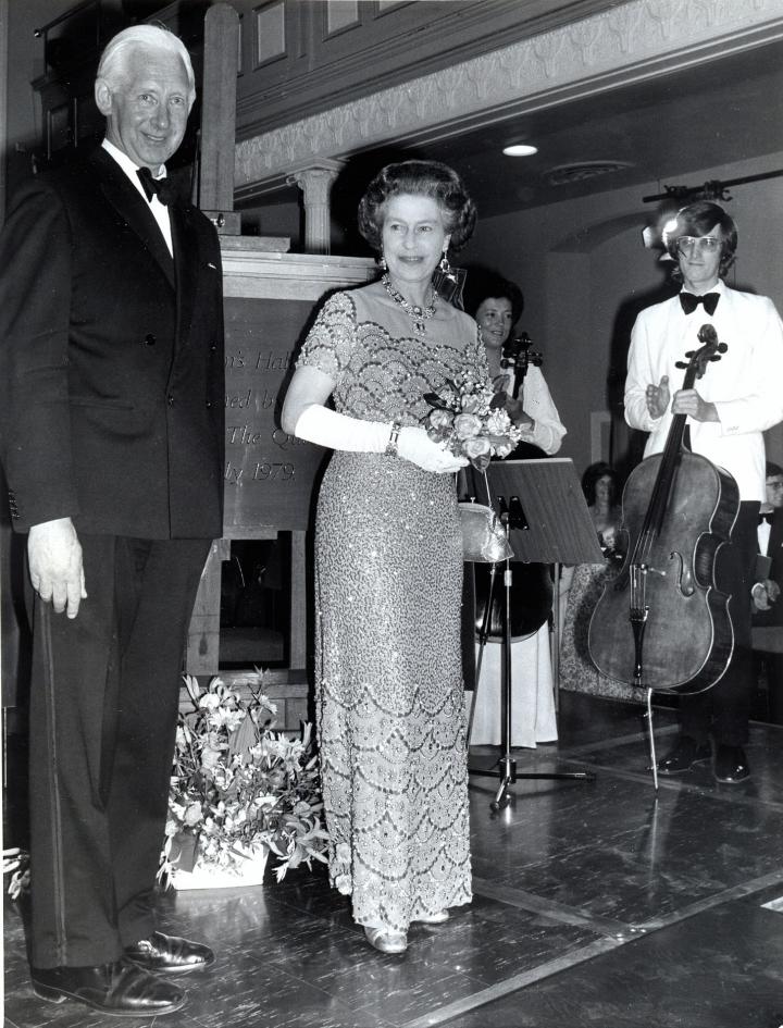 A black and white image of HM Queen Elizabeth II at The Queen's Hall 