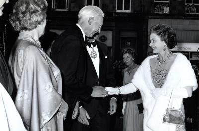 A black and white image of HM Queen Elizabeth II at The Queen's Hall 