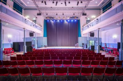 The Queen's Hall auditorium towards stage with rowed seats