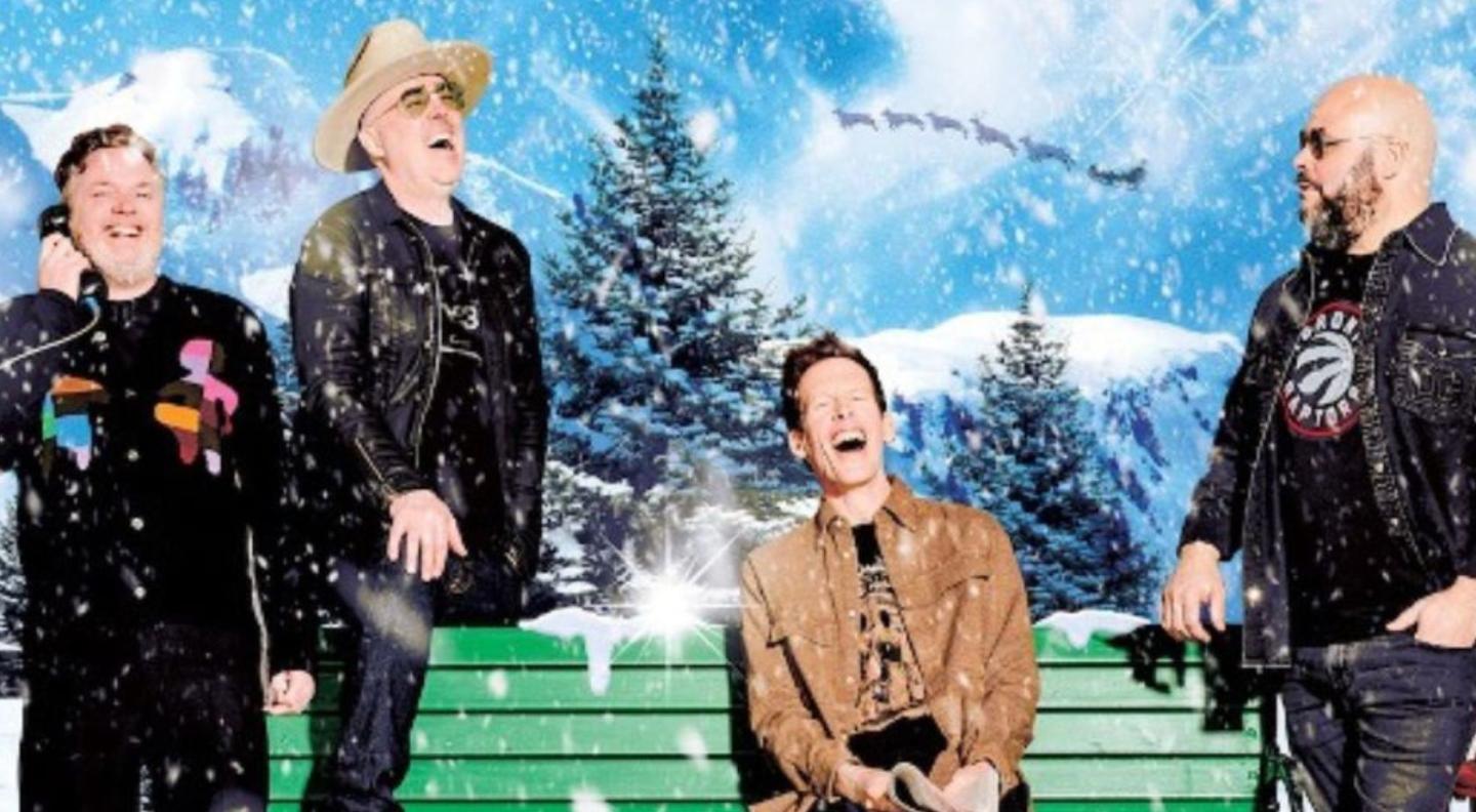 The four members of the Barenaked Ladies in a Wintery scene