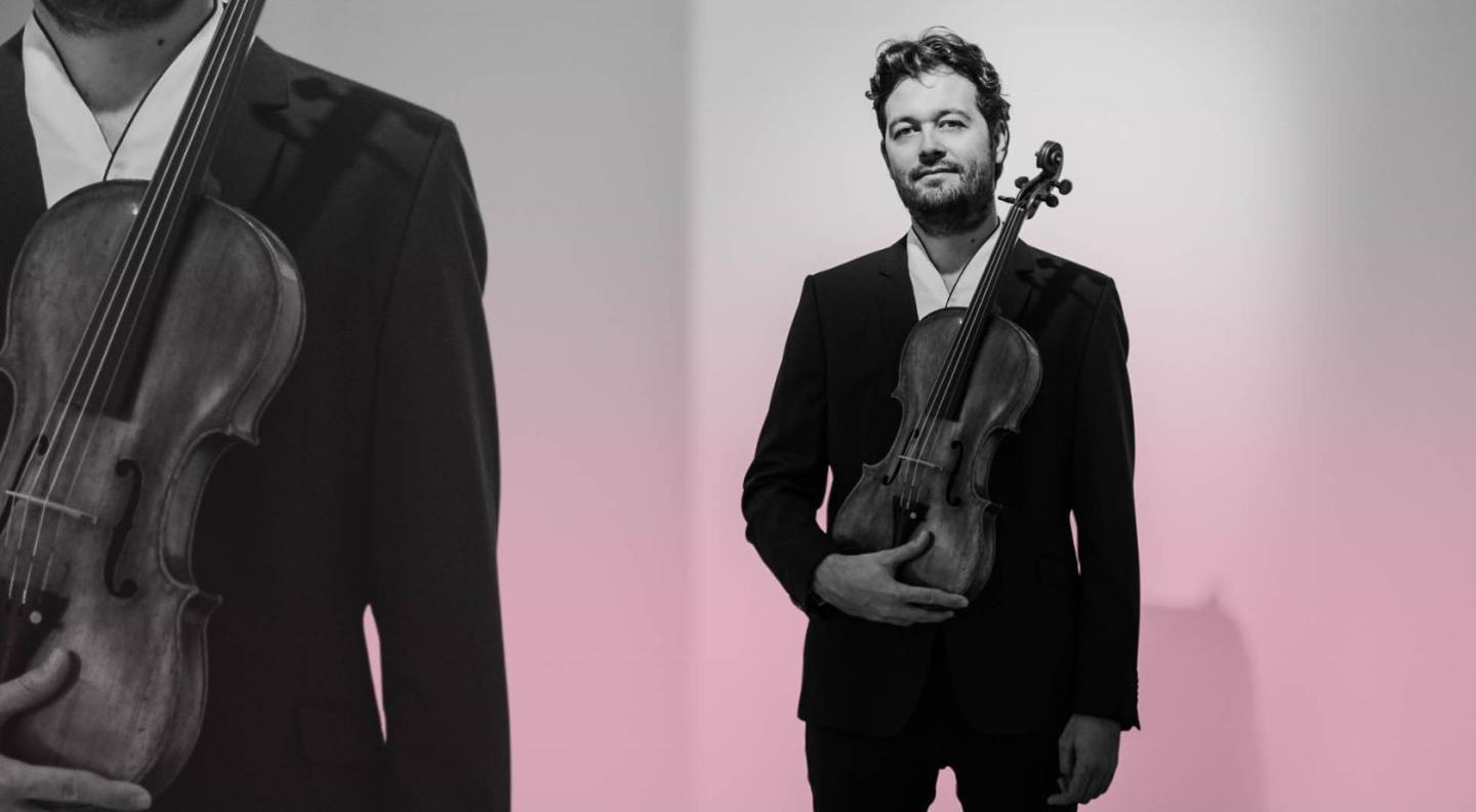 Lawrence Power holding his viola