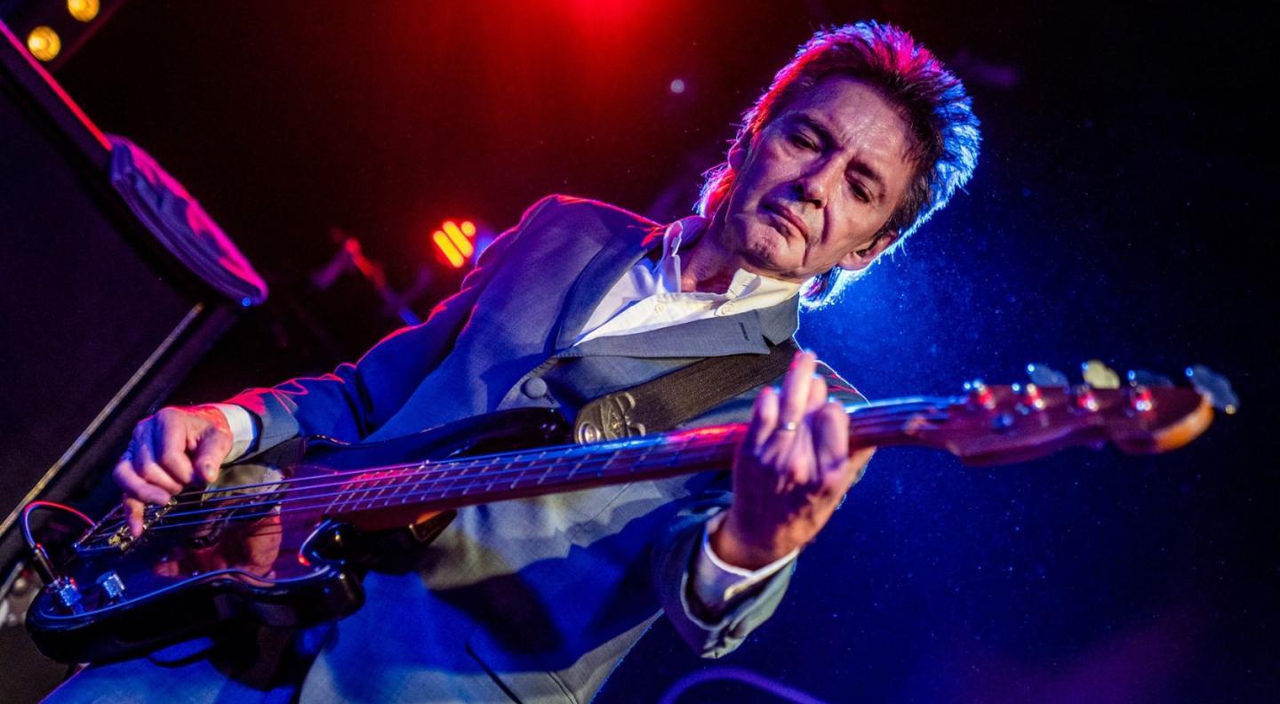 Bruce Foxton playing the guitar