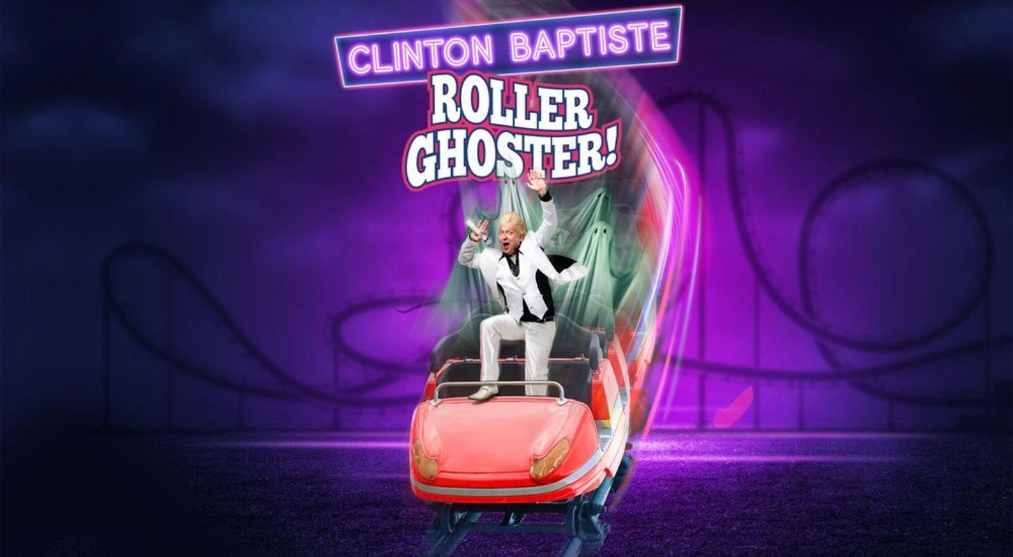 A man in a white suit rides a rollercoaster against a dark purple background