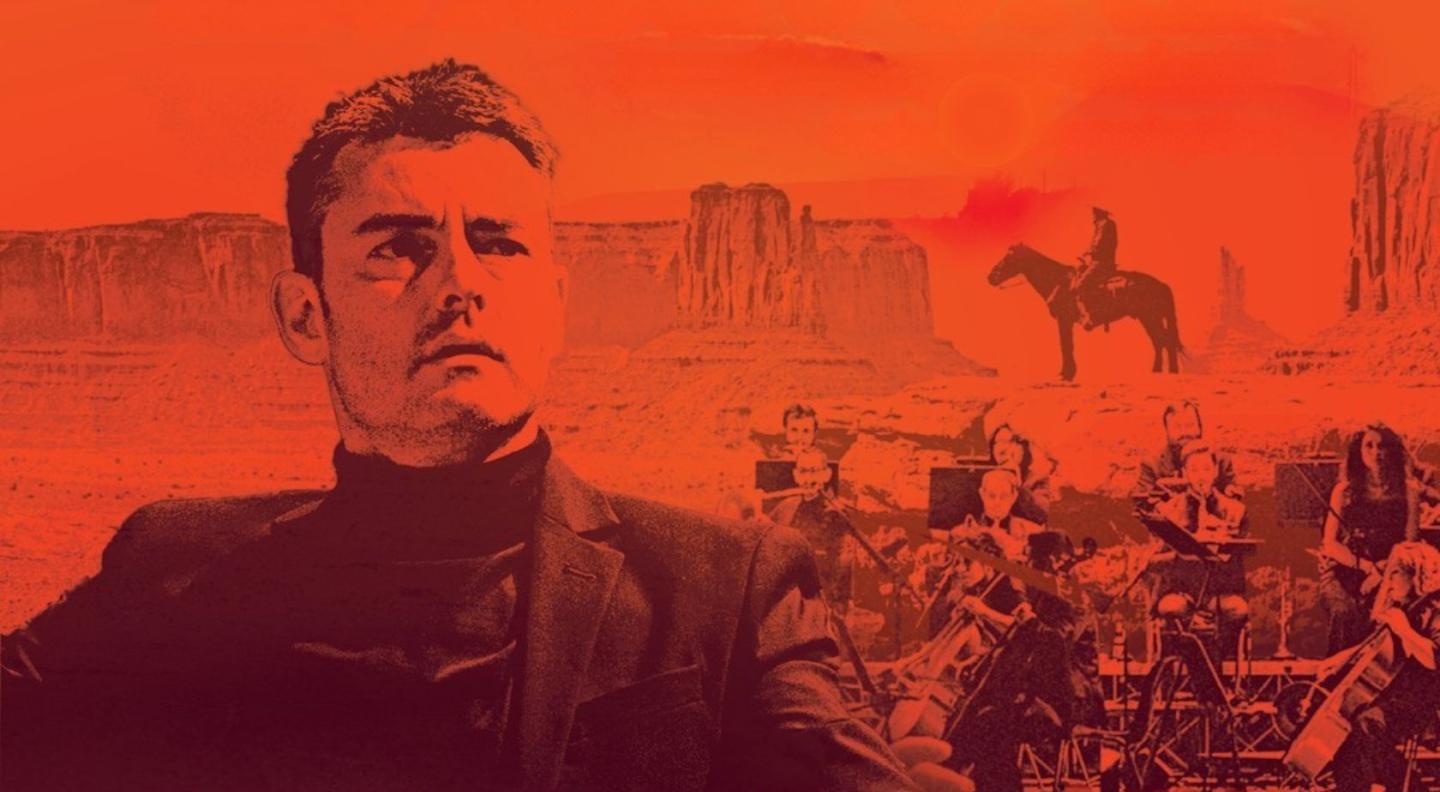 An image of conductor Giacomo Loprieno with an orange overlay