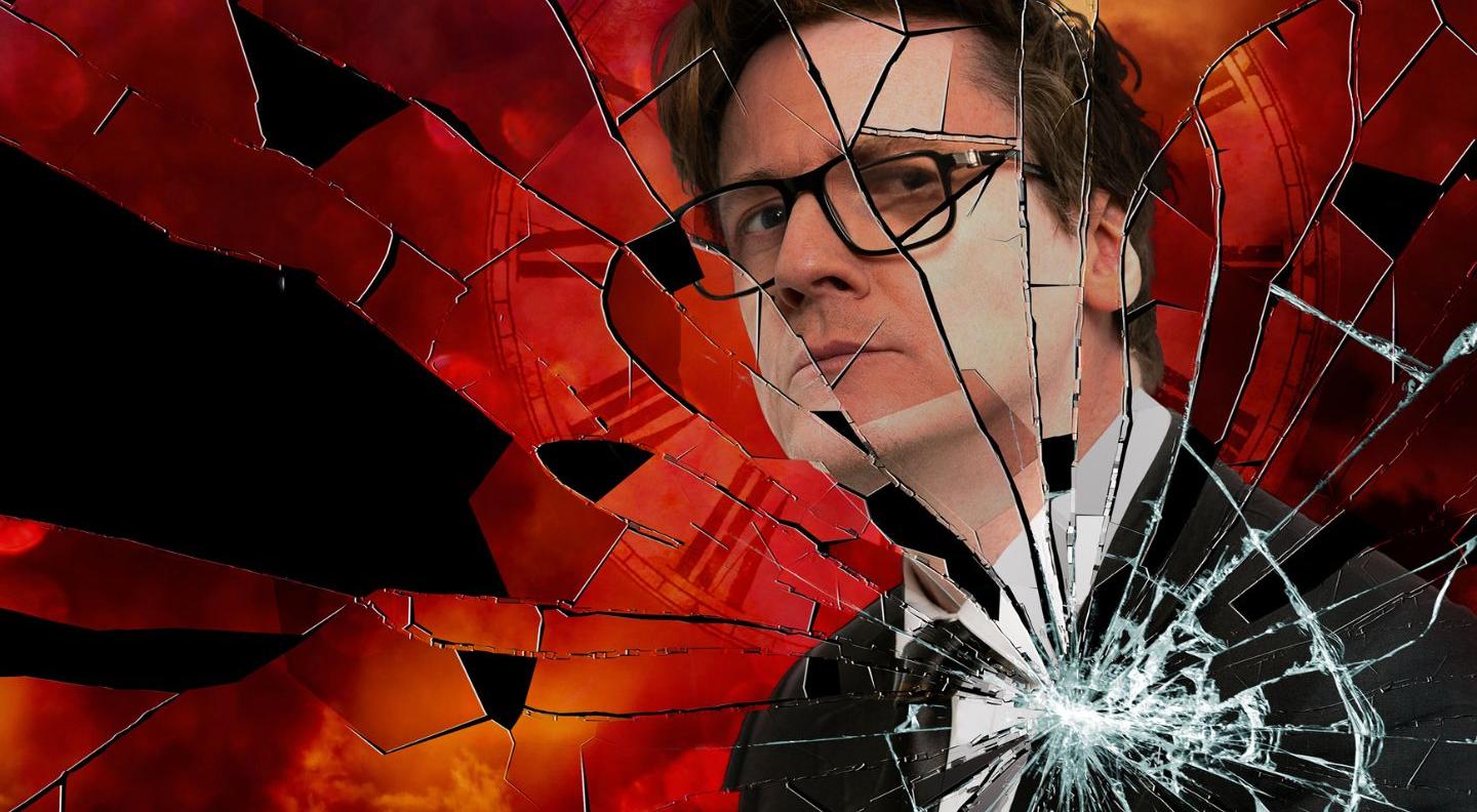 An image of Ed Byrne against a red background, with a shattered glass effect over the top