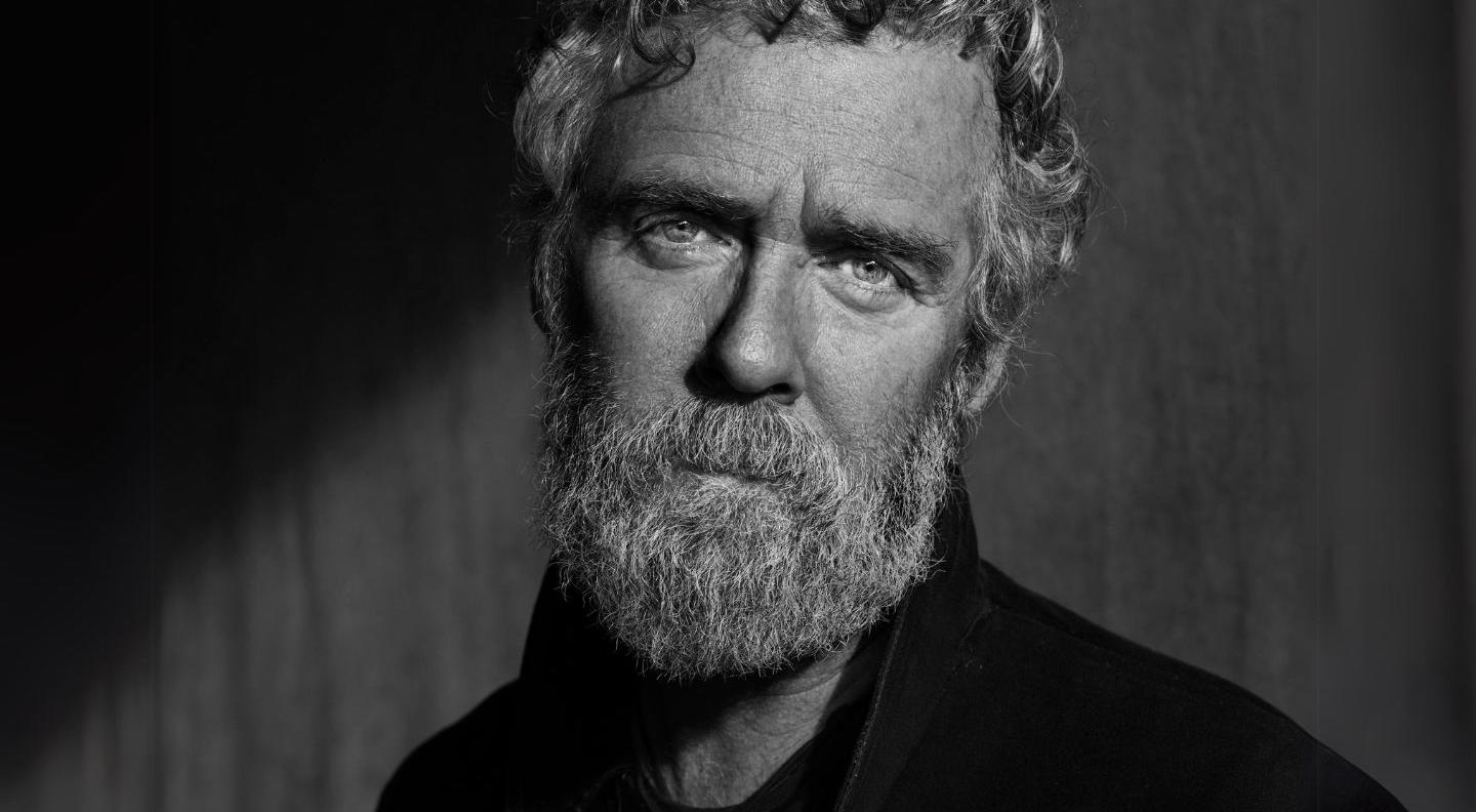 a black and white portrait of Glen Hansard