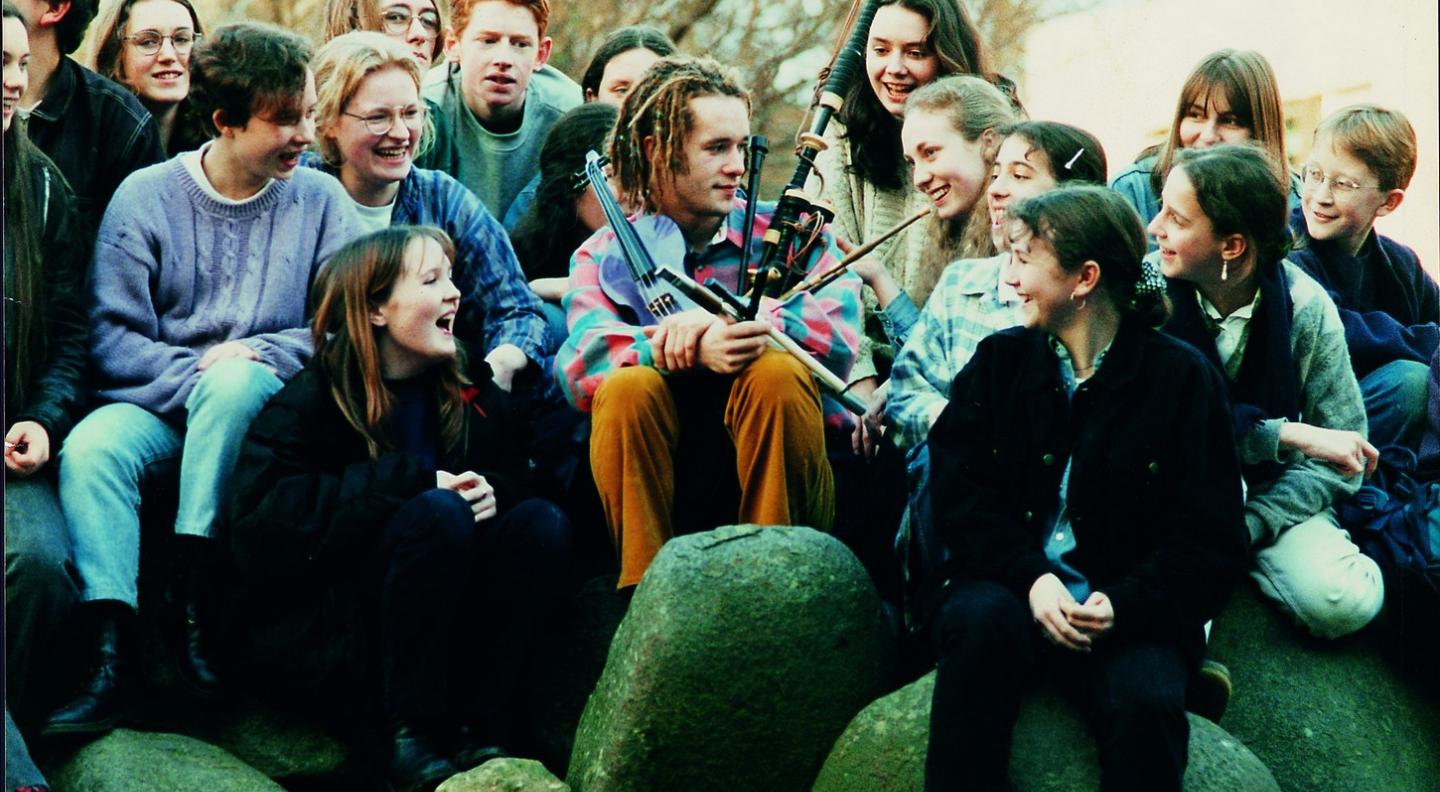 Martyn Bennett surrounded by pupils from The City of Edinburgh Music School