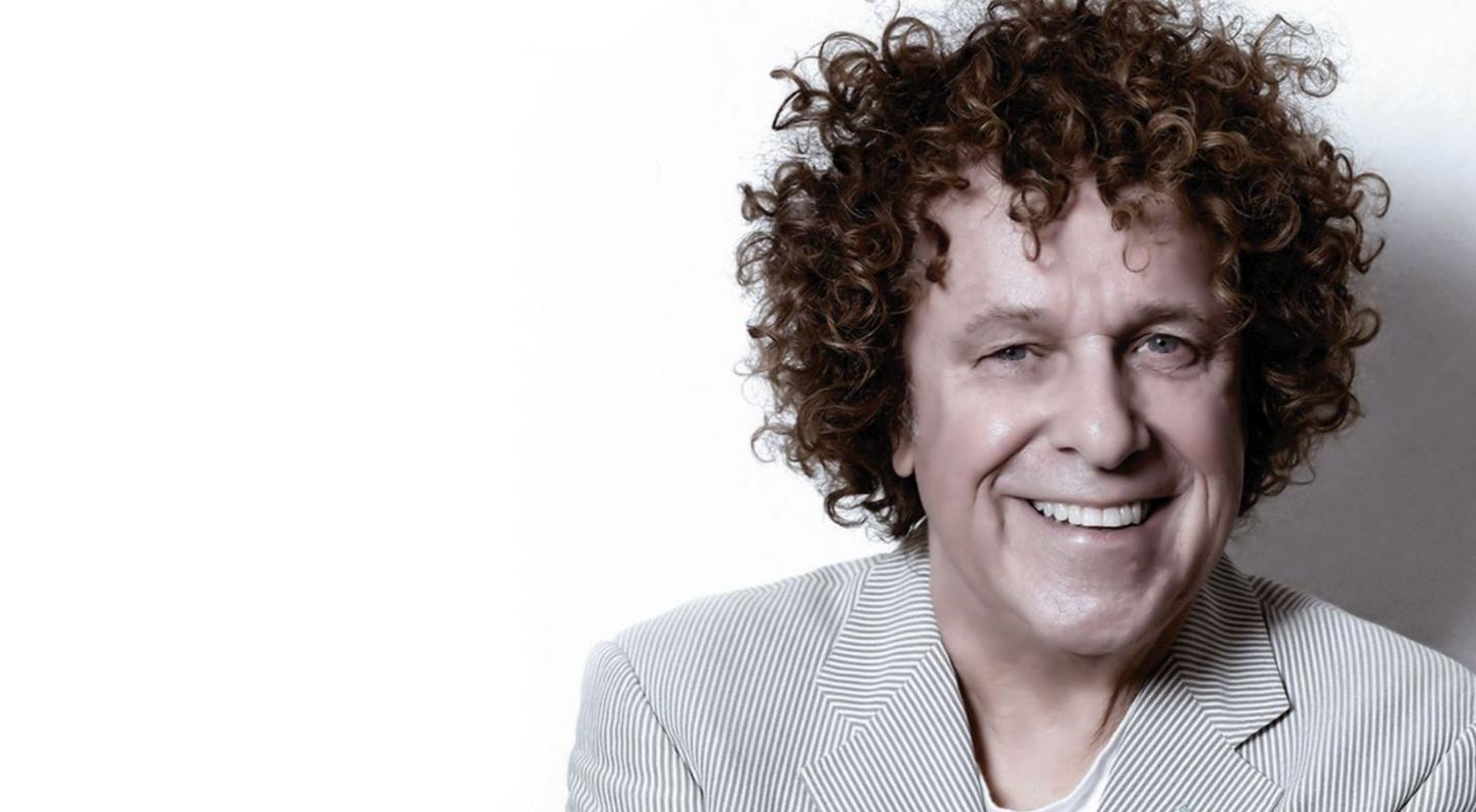 An image of Leo Sayer, a white man with curly brown hair